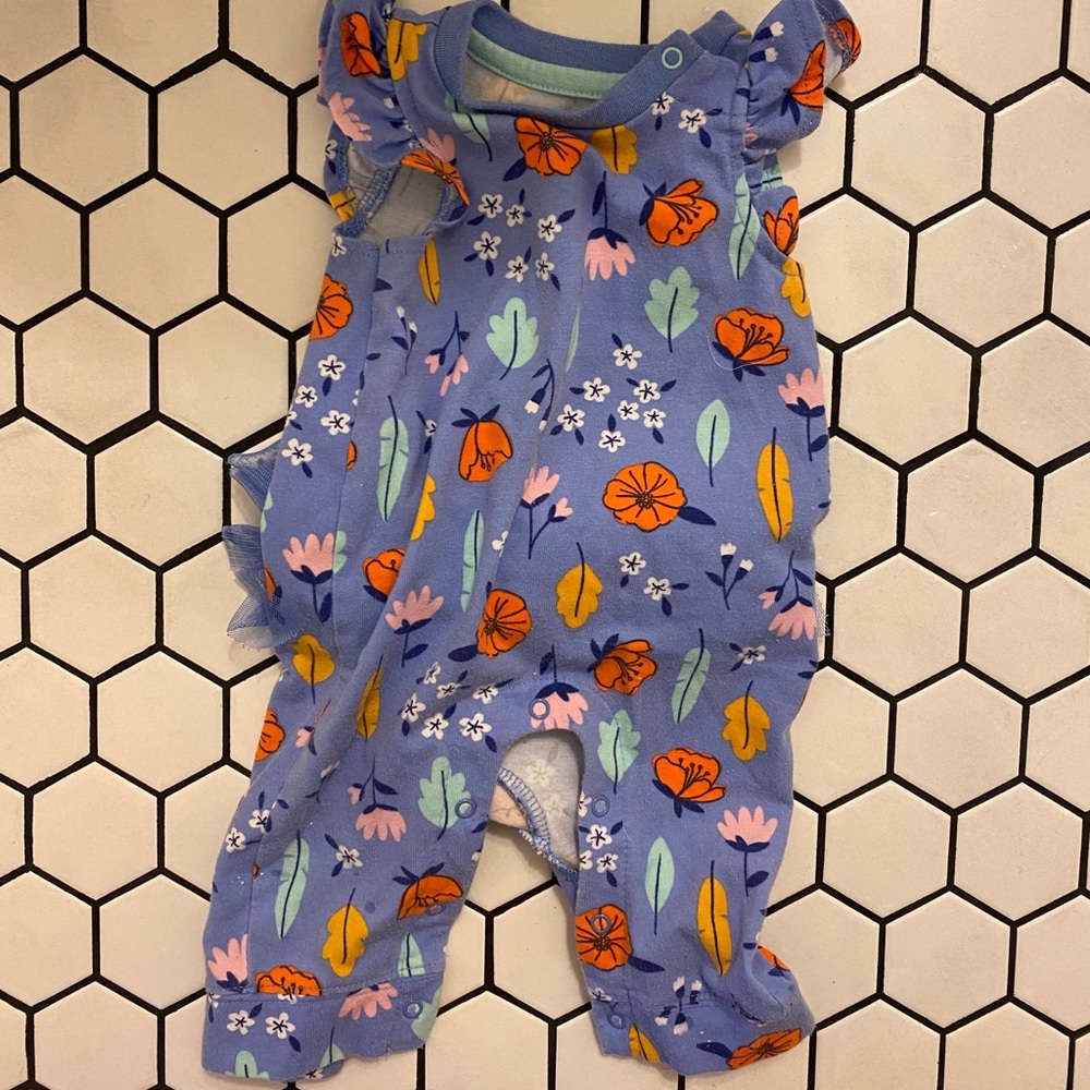 Newborn Baby girl floral romper with ruffle butt.